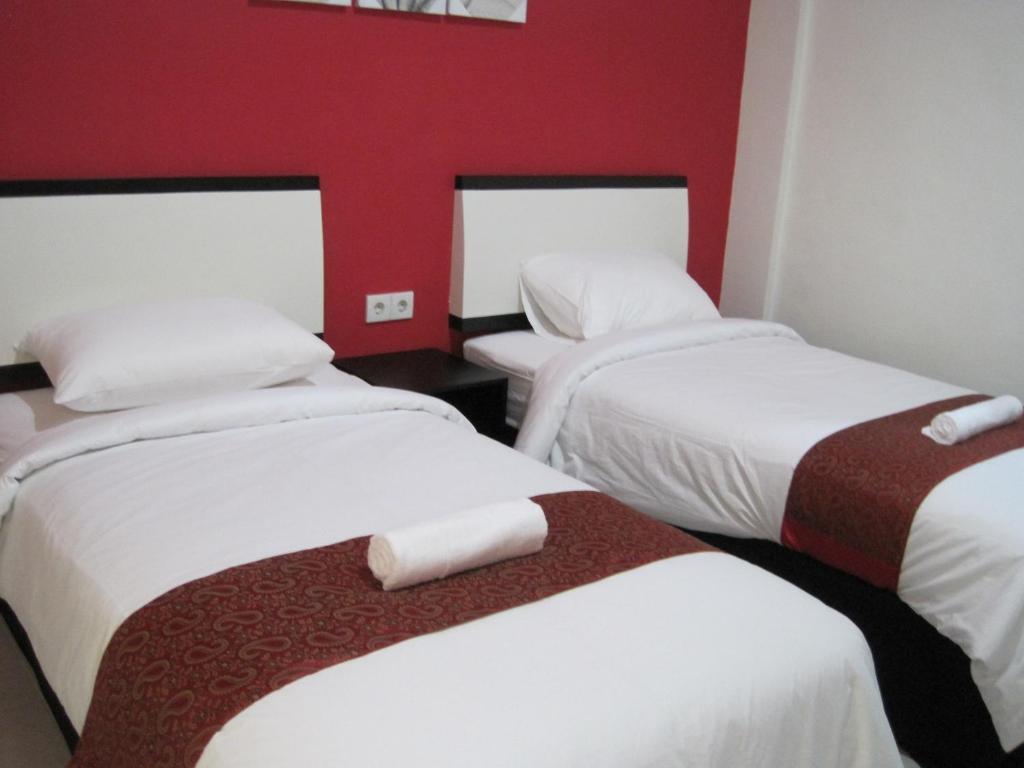 Budhi Hotel Kuta Lombok Quarto foto